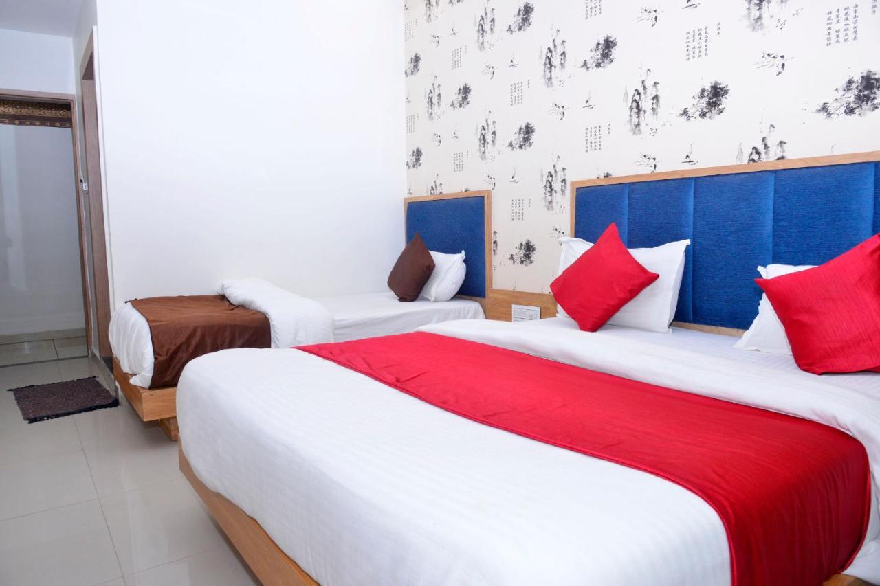 Hotel Asopalav Гандинагар Екстериор снимка